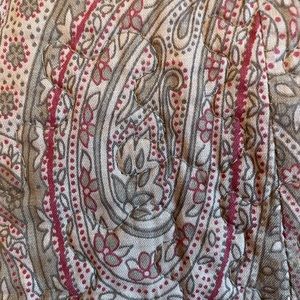 King sized embroidered quilt with 2 king shams.